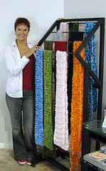 A retail rack designed and built 
to display hand knitted scarves